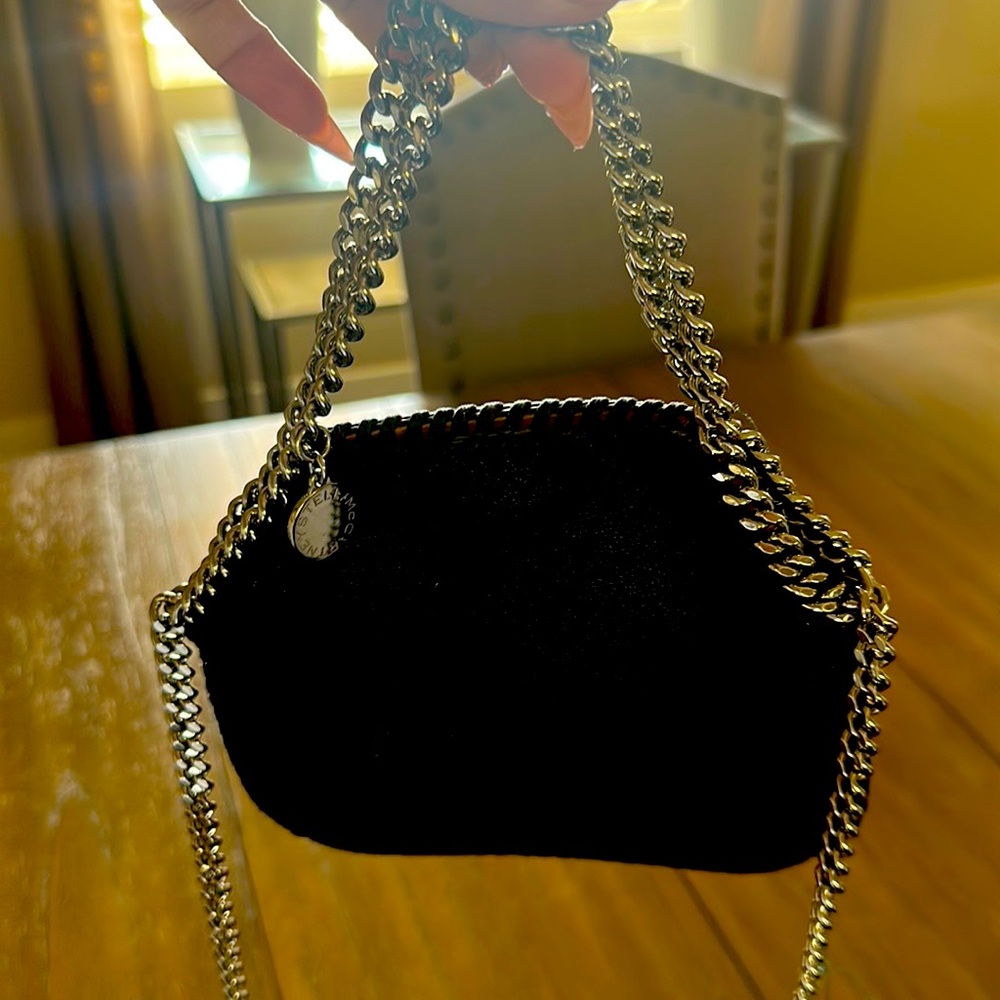 Used Stella McCartney in good condition.Great for going out or running errands.